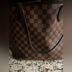 Used condition no marks on bag outside in excellent condition